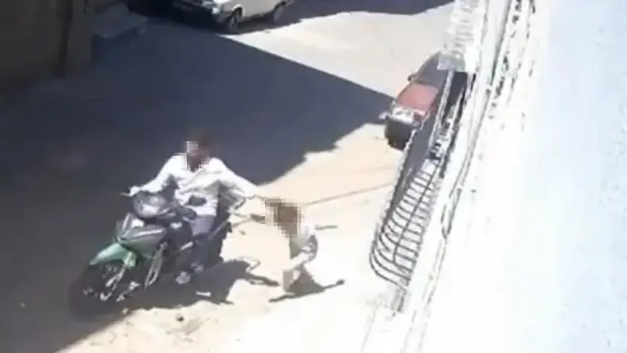 Küçük kızını motosikletle sürükleyen baba gözaltına alındı