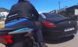 Motosiklet sürücüsünün metrelerce sürüklendiği kaza aksiyon kamerasına yansıdı