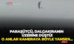 Paraşütçü, dalgakıranın üzerine düştü, o anlar kameraya böyle yansıdı...