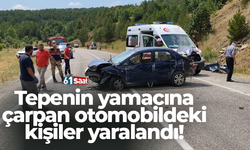 Tepenin yamacına çarpan otomobildeki kişiler yaralandı!