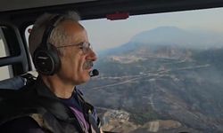 Bakan Uraloğlu, helikopterle yangın bölgesini havadan inceledi