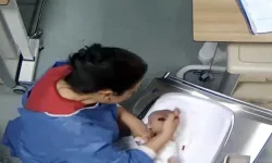 O hemşirenin bir başka bebeği daha darbettiği görüntüler ortaya çıktı