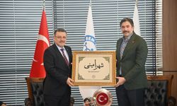 Başkan Genç'ten Uslu'ya ziyaret!