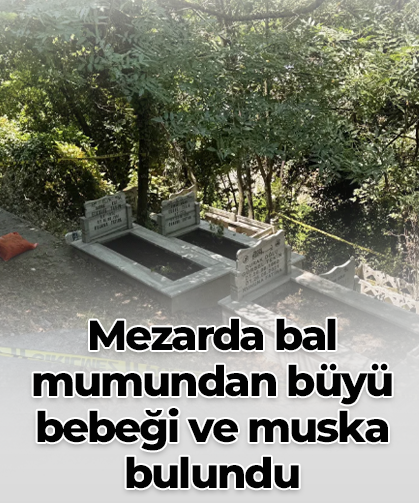 Mezarda bal mumundan büyü bebeği ve muska bulundu