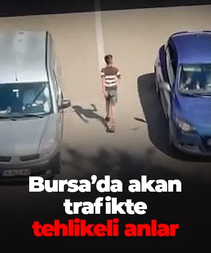 Bursa’da çocuğun trafikte tehlikeli yürüyüşü kamerada