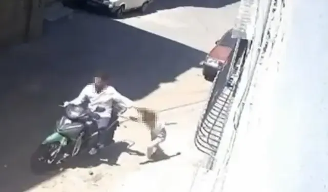 Küçük kızını motosikletle sürükleyen baba gözaltına alındı